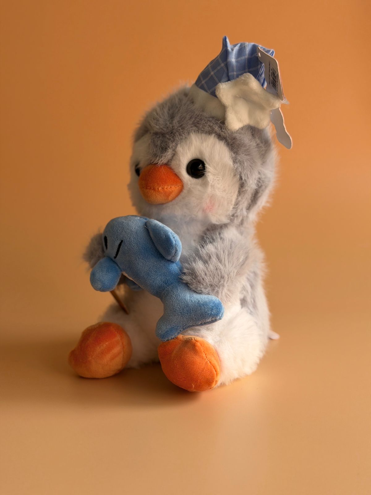 Pingüino con pez 23cm 31495