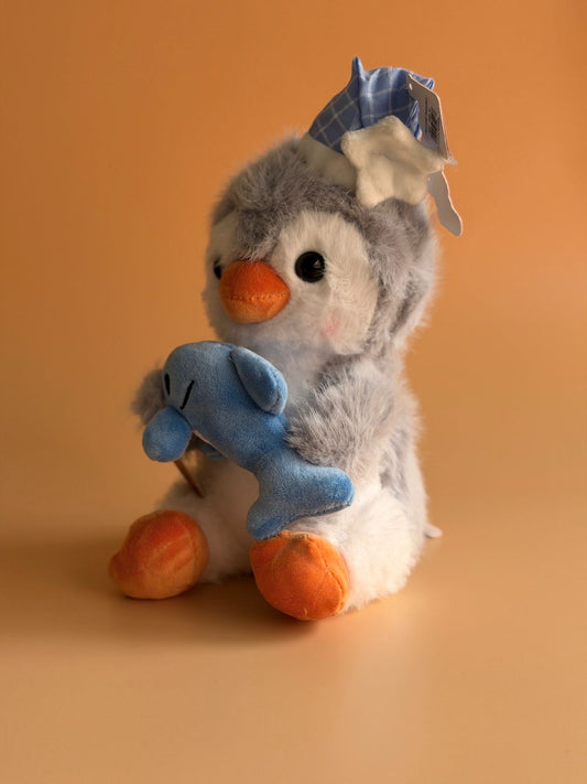 Pingüino con pez 23cm 31495